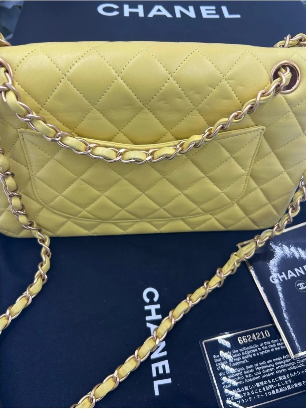 Women’s Chanel, classic quilted double flap bag in yellow with Gould hardware